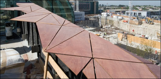 Child's Play The view from the museum's roof across rapidly developing Sandyford. The external wood cladding can be seen in the foreground and to the left is the upper area of structural glazing