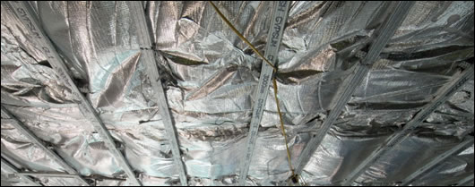 Actis EcoQuilt Multi Foil insulation, with an advertised U-value of 0.2, separates each floor from the one below it.