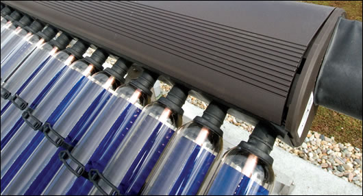 One of the two arrays of solar panels taking full advantage of the low-pitched roof’s southerly aspect One of the two arrays of solar panels taking full advantage of the low-pitched roof’s southerly aspect