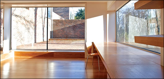 Underfloor heating fed by a geothermal heat pump lies discreetly beneath a high-spec timber floor Underfloor heating fed by a geothermal heat pump lies discreetly beneath a high-spec timber floor