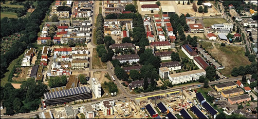 Roof mounted solar panels on the eco-buildings at Vauban, Freinburg. Note the eco homes are oriented towards the sun, whilst many of the conventional buildings are facing east or west Roof mounted solar panels on the eco-buildings at Vauban, Freinburg. Note the eco homes are oriented towards the sun, whilst many of the conventional buildings are facing east or west