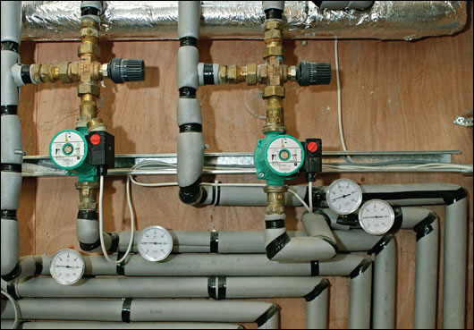 The factory's underfloor heating system is divided into eight different zones, controlled through a plant room adjacent to the factory floor The factory's underfloor heating system is divided into eight different zones, controlled through a plant room adjacent to the factory floor