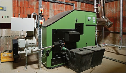 The 100kW HDG wood chip boiler that heats the factory is housed in an underground boiler house The 100kW HDG wood chip boiler that heats the factory is housed in an underground boiler house