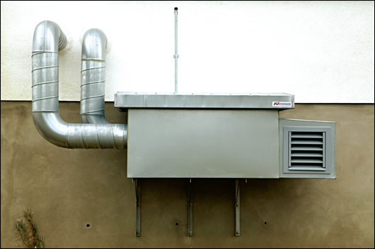 The Enervent thermal wheel heat recovery unit. Four further MVHR units are installed adjacent to the factory's bathrooms and showers The Enervent thermal wheel heat recovery unit. Four further MVHR units are installed adjacent to the factory's bathrooms and showers