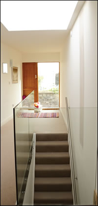 A glass balustrade helps to make the most of daylight in the extension A glass balustrade helps to make the most of daylight in the extension