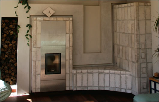 The kachelofen, which is common to central and eastern Europe, is a ceramic-tiled woodstove which generates a low-intensity radiant heat The kachelofen, which is common to central and eastern Europe, is a ceramic-tiled woodstove which generates a low-intensity radiant heat