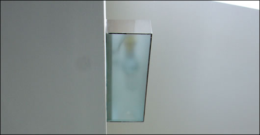 Homeowner Stephen Hegarty purchased contemporary light fixtures and replaced the incandescent bulbs with CFLs Homeowner Stephen Hegarty purchased contemporary light fixtures and replaced the incandescent bulbs with CFLs