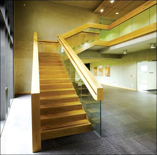 The exposed concrete walls are effective at soaking up and storing heat while The exposed concrete walls are effective at soaking up and storing heat while