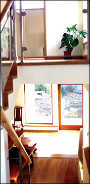 The split level led to the development of a moveable stair that allows flexibility in use of the space The split level led to the development of a moveable stair that allows flexibility in use of the space