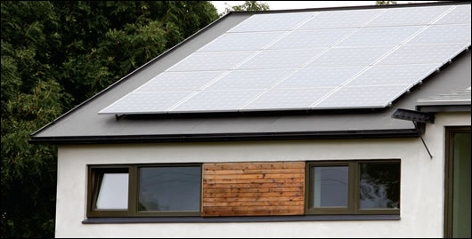 One of the two banks of solar photovoltaic panels, supplied by CareyGlass Solar, which will play a key role in achieving energy plus status One of the two banks of solar photovoltaic panels, supplied by CareyGlass Solar, which will play a key role in achieving energy plus status