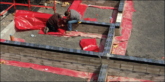 Perinsul blocks were laid on top of Quinnlite blocks to support all load bearing walls Perinsul blocks were laid on top of Quinnlite blocks to support all load bearing walls