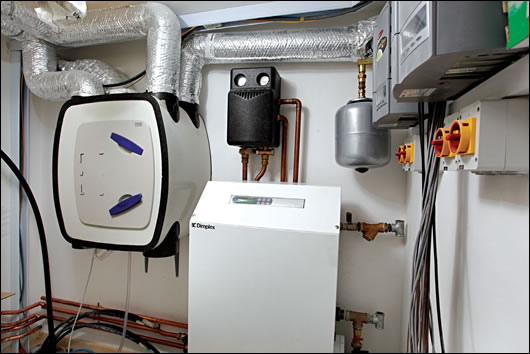 The Xpelair HRV unit and Dimplex heat pump, which draws energy from ground loop collectors The Xpelair HRV unit and Dimplex heat pump, which draws energy from ground loop collectors
