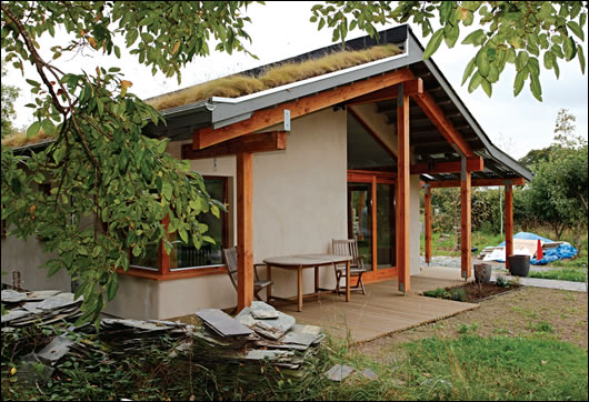 The roof features grass roofing to the rear and a sloping slate finish to the front. The slate roof is designed to be The roof features grass roofing to the rear and a sloping slate finish to the front. The slate roof is designed to be