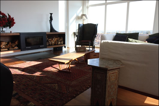 A Conmoto wood burning stove provides supplementary space heating when needed and provides a visual focal point A Conmoto wood burning stove provides supplementary space heating when needed and provides a visual focal point