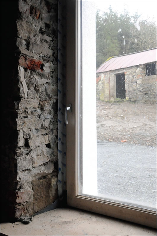 An upgrade in Cavan by architect Frank Cooney, with externally insulated exposed stone walls lending thermal mass An upgrade in Cavan by architect Frank Cooney, with externally insulated exposed stone walls lending thermal mass
