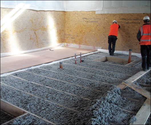 “Although the building is steel-framed…it is essentially timber by volume,” Hughes writes. Timber was chosen because of its low embodied energy, good thermal properties, and the ease of working with the material “Although the building is steel-framed…it is essentially timber by volume,” Hughes writes. Timber was chosen because of its low embodied energy, good thermal properties, and the ease of working with the material